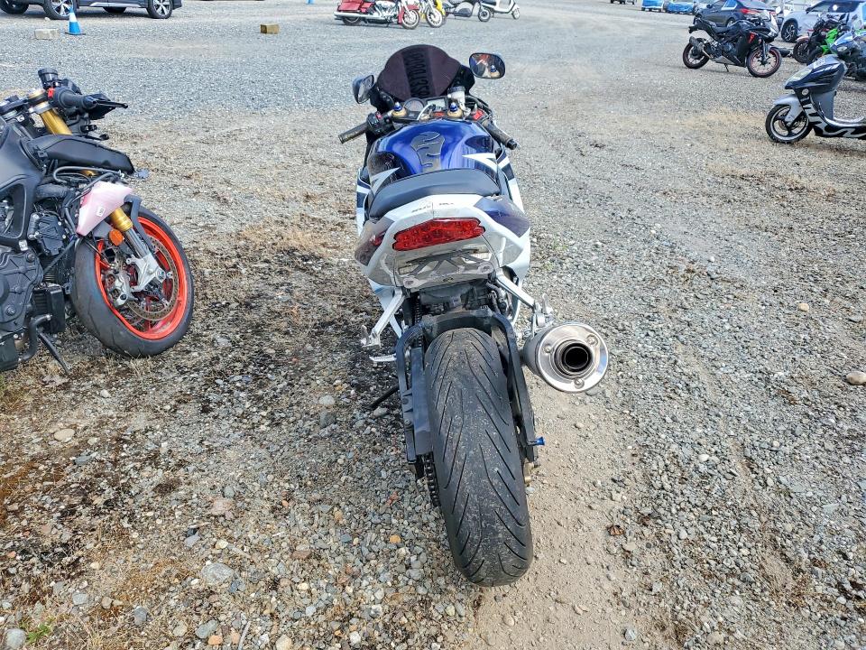 2004 Suzuki Gsx-r750 k VIN JS1GR7JA642104937 COPART salvage auction — SIDE, Ok - Certificate Of Title, sold $1,650 on 2026-07-20 (photo 4)