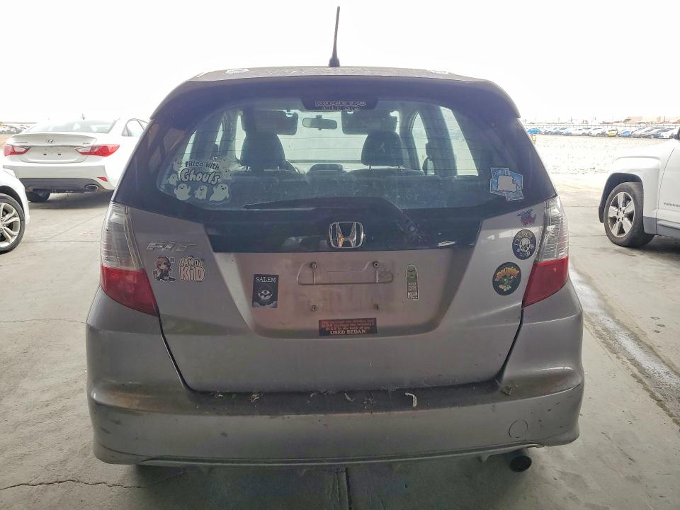 2010 Honda Fit VIN JHMGE8H64AS025804 COPART salvage auction — SIDE, MA - DIS/DLR/EXP ONLY CLEAN TITLE, sold $1,050 on 2026-07-13 (photo 6)