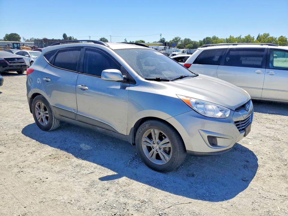 2011 Hyundai Tucson VIN KM8JU3AC7BU193659 COPART salvage auction — SIDE, CA - DIS/DLR/EXP ONLY CLEAN TITLE, sold $3,273 on 2026-07-09 (photo 4)