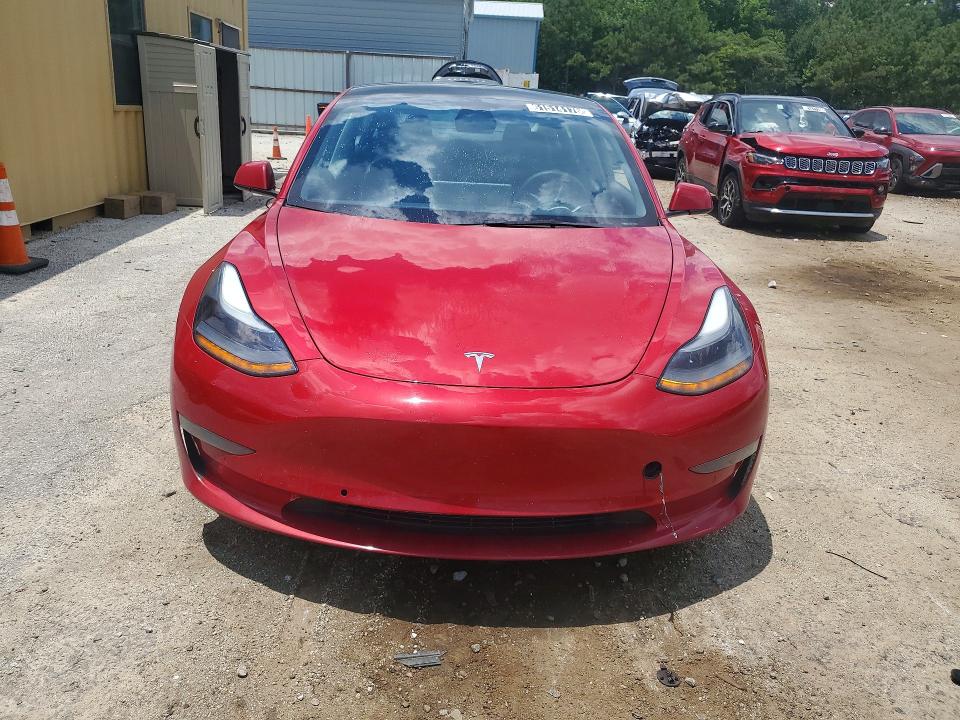 2022 Tesla Model 3 VIN 5YJ3E1EA4NF290385 COPART salvage auction — REAR END, FL - CERTIFICATE OF TITLE, sold $7,200 on 2026-07-29 (photo 5)