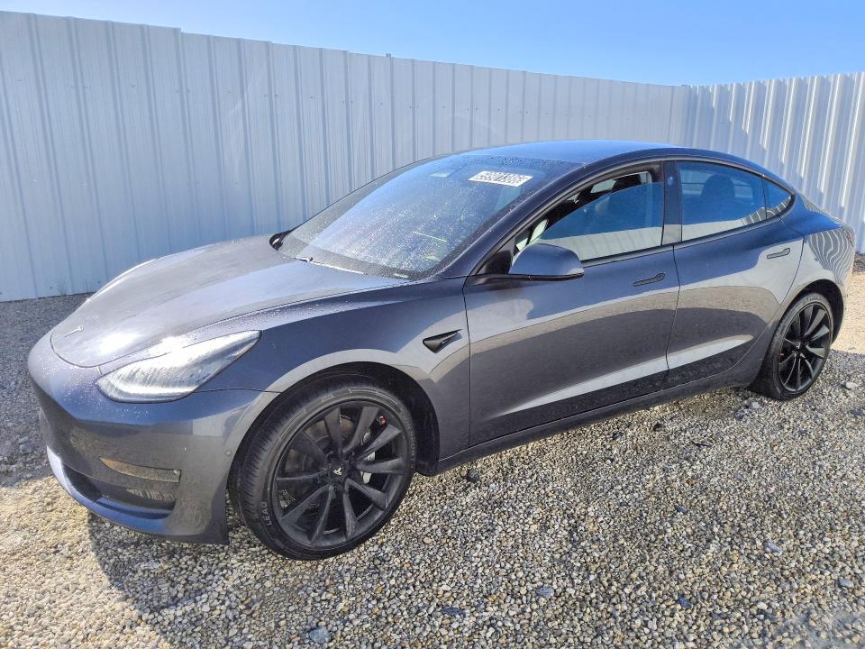 2018 Tesla Model 3 VIN 5YJ3E1EB7JF185035 COPART salvage auction — NORMAL WEAR, Fl - Certificate Of Title, sold $10,900 on 2026-07-28 (photo 1)