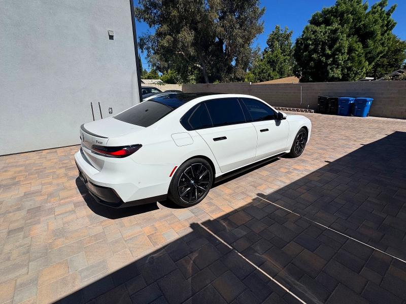 2024 BMW 7er VIN WBA23EH08RCP73339 COPART salvage auction — NORMAL WEAR, Ca - Dis/Dlr/Exp Only Clean Title (P), sold $39,750 on 2026-07-27 (photo 4)