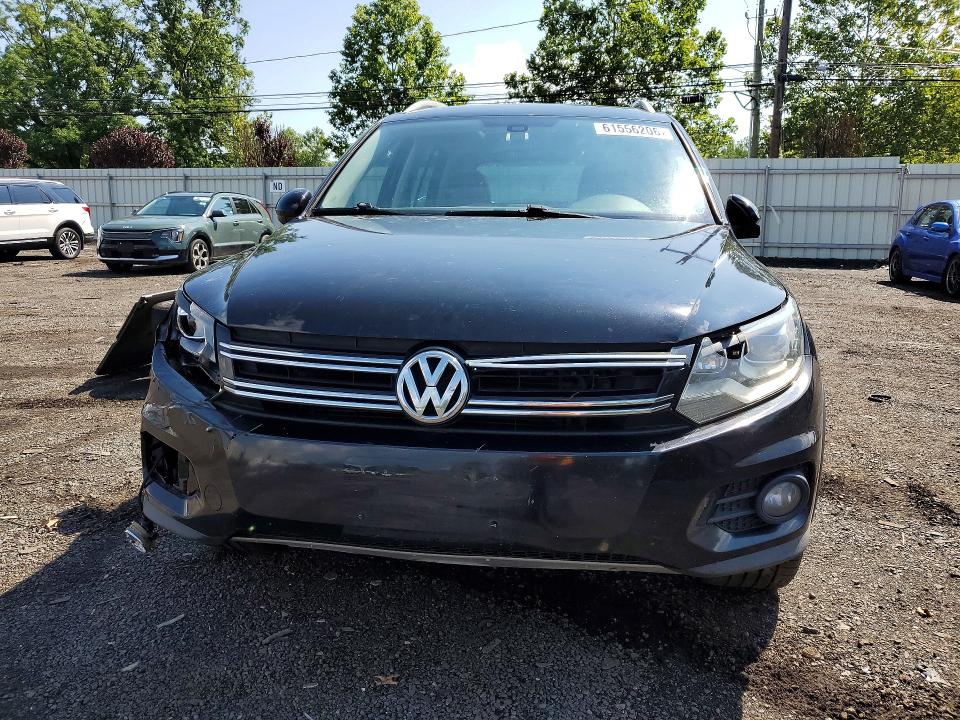 2013 Volkswagen Tiguan VIN WVGBV3AX7DW614386 COPART salvage auction — MECHANICAL, Ct - Certificate Of Title, sold $475 on 2026-08-07 (photo 5)