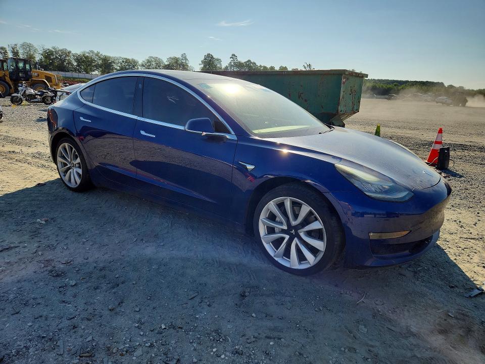 2018 Tesla Model 3 VIN 5YJ3E1EB1JF133867 COPART salvage auction — MINOR DENT/SCRATCHES, Nc - Dealer Only Clean Title (P), sold $7,300 on 2026-08-19 (photo 4)