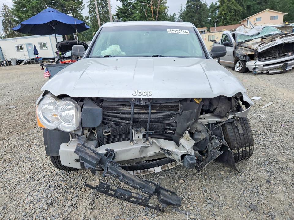 2010 Jeep Grand cherokee VIN 1J4PR4GK8AC119699 COPART salvage auction — FRONT END, WA - BILL OF SALE, sold $200 on 2026-07-17 (photo 5)
