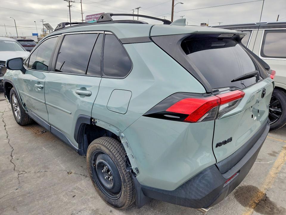 2023 Toyota Rav 4 VIN 2T3W1RFV0PW287635 COPART salvage auction — SIDE, Ca - Salvage Certificate, sold $11,900 on 2026-09-24 (photo 2)