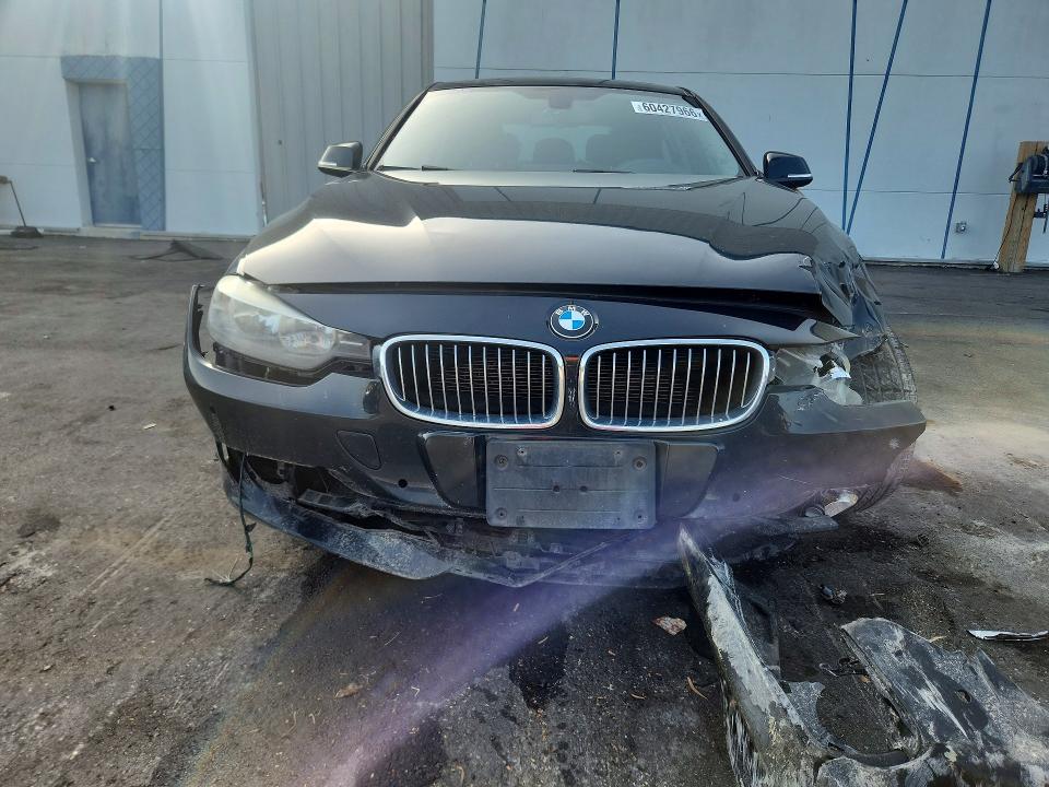 2012 BMW VIN WBA3A5C58CF257405 COPART salvage auction — FRONT END, Fl - Cert Of Title Slvg Rebuildable, sold $900 on 2026-08-12 (photo 5)
