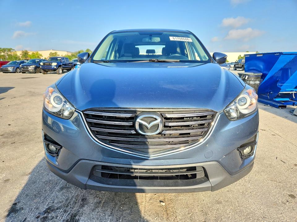 2016 Mazda Cx-5 VIN JM3KE4CY1G0882414 COPART salvage auction — REAR END, Fl - Cert Of Title Slvg Rebuildable, sold $1,400 on 2026-07-28 (photo 5)