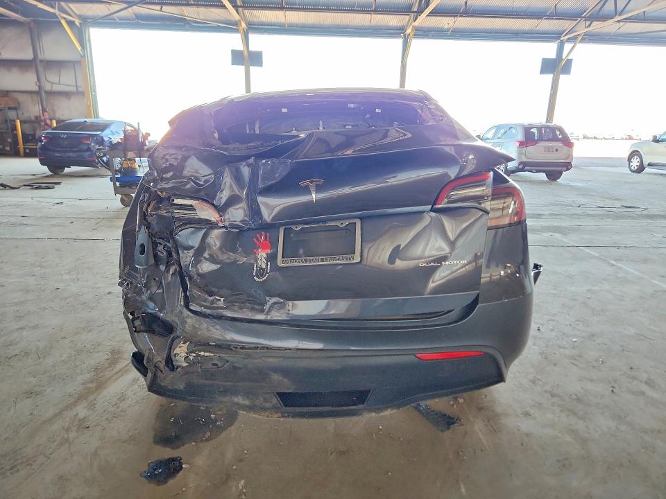 2023 Tesla Model y VIN 7SAYGDEE9PF709423 COPART salvage auction — ALL OVER, AZ - CERT OF TITLE- NON REPAIR, sold $3,050 on 2026-07-27 (photo 6)