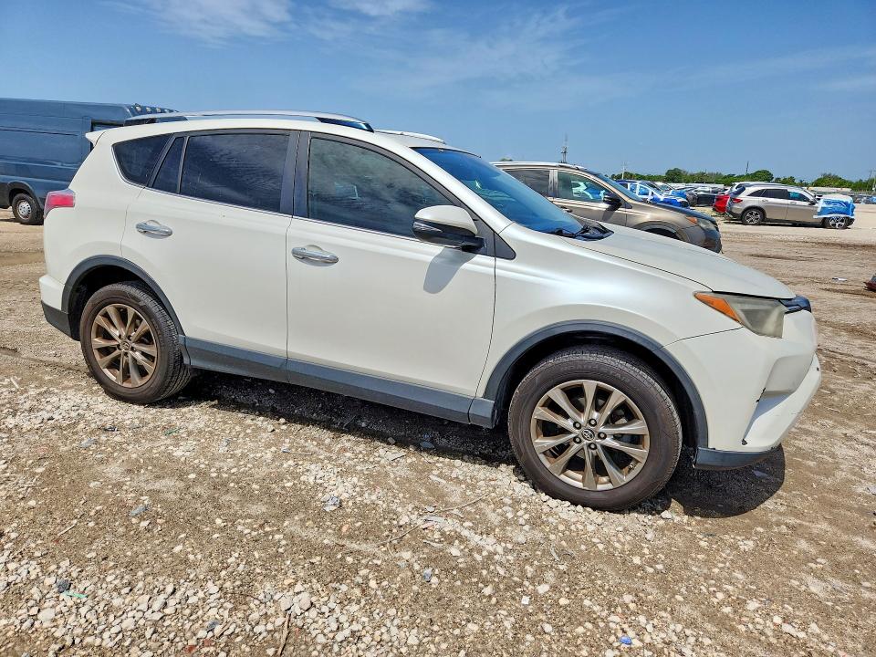2018 Toyota VIN JTMYFREV5JD124740 COPART salvage auction — MINOR DENT/SCRATCHES, Fl - Certificate Of Title, sold $7,600 on 2026-07-16 (photo 4)