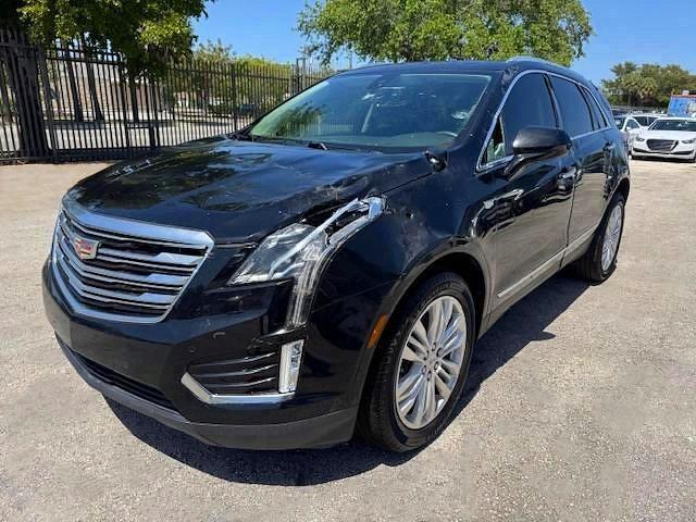 2018 Cadillac Xt5 VIN 1GYKNERS6JZ139813 COPART salvage auction — SIDE, Fl - Certificate Of Destruction (P), sold $5,600 on 2026-07-09 (photo 1)