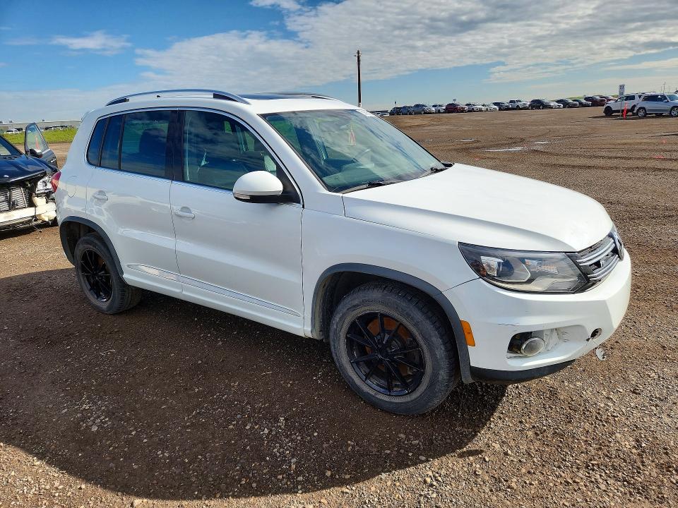 2016 Volkswagen Tiguan VIN WVGJV7AX1GW500794 COPART salvage auction — MECHANICAL, Ab - Bos - Rebuilt, sold $975 on 2026-07-28 (photo 4)