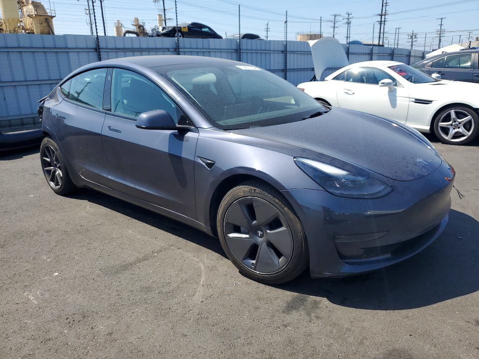 2023 Tesla Model 3 VIN 5YJ3E1EAXPF433018 COPART salvage auction — REAR END, Ca - Salvage Certificate, sold $7,100 on 2026-07-27 (photo 4)