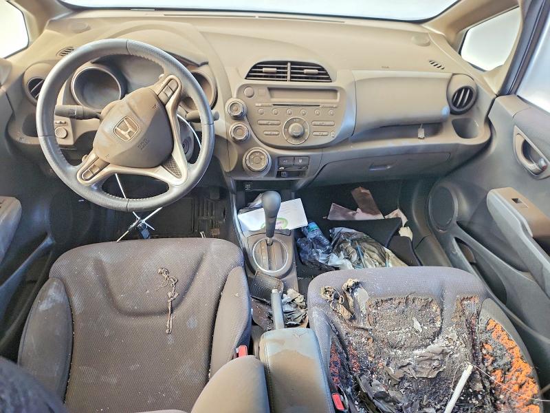 2013 Honda Fit VIN JHMGE8H59DC076284 COPART salvage auction — BURN, WI - JUNKED VEHICLE BILL OF SALE, sold $525 on 2026-07-20 (photo 8)