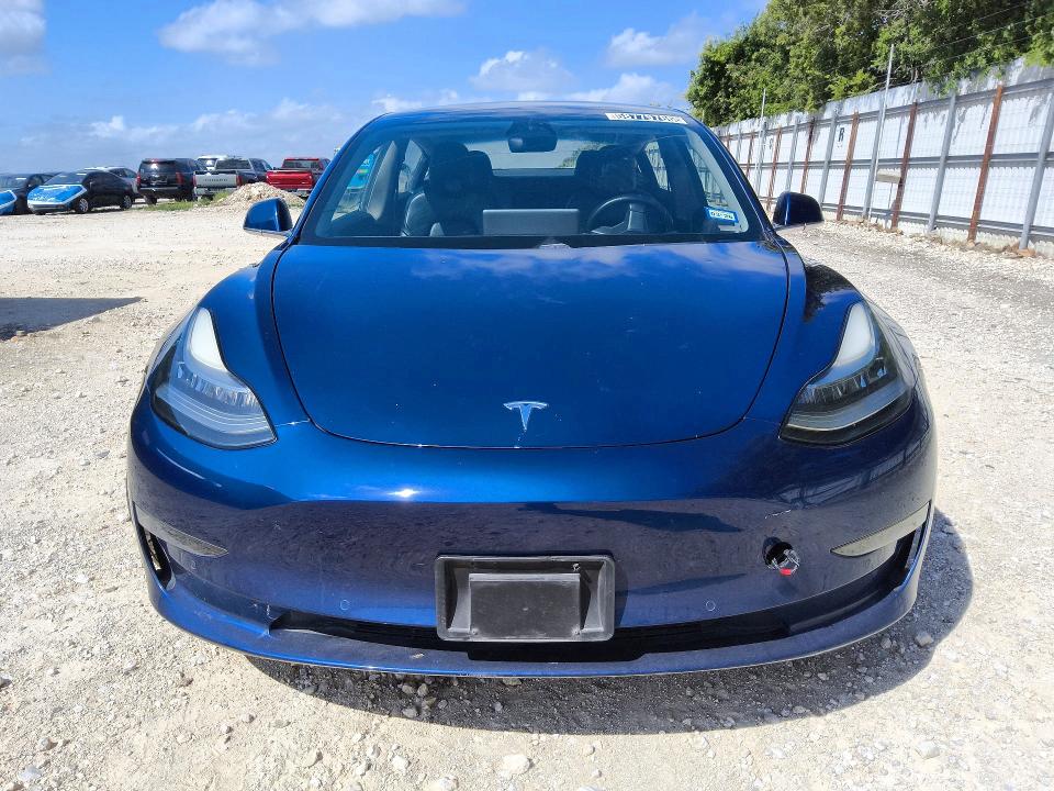 2018 Tesla Model 3 VIN 5YJ3E1EA1JF041715 COPART salvage auction — BURN, TX - CERTIFICATE OF TITLE (P), sold $100 on 2026-07-21 (photo 5)