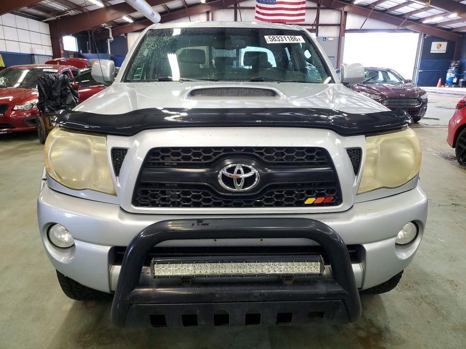 2011 Toyota Tacoma VIN 5TFLU4EN0BX018277 COPART salvage auction — MINOR DENT/SCRATCHES, MA - CERTIFICATE OF TITLE, sold $475 on 2026-07-23 (photo 5)
