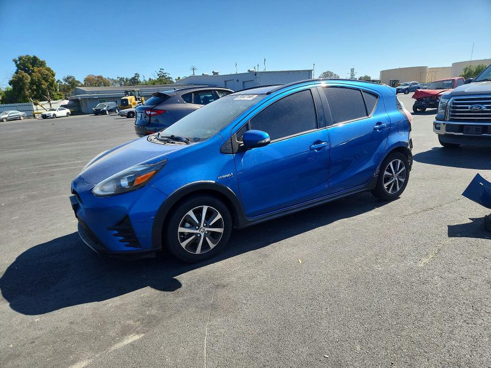 2018 Toyota Prius c VIN JTDKDTB37J1606591 COPART salvage auction — REAR END, Ca - Salvage Certificate, sold $90 on 2026-07-29 (photo 1)