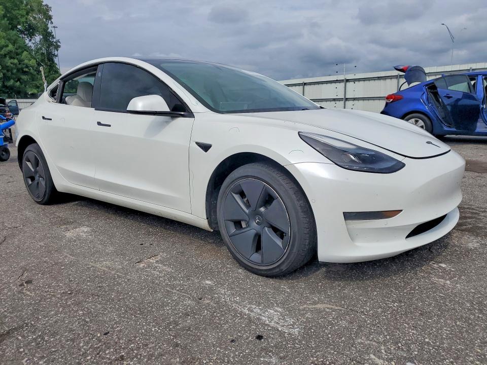 2021 Tesla Model 3 VIN 5YJ3E1EA5MF048865 COPART salvage auction — REAR END, Nc - Salvage Certificate Of Title, sold $325 on 2026-07-28 (photo 4)