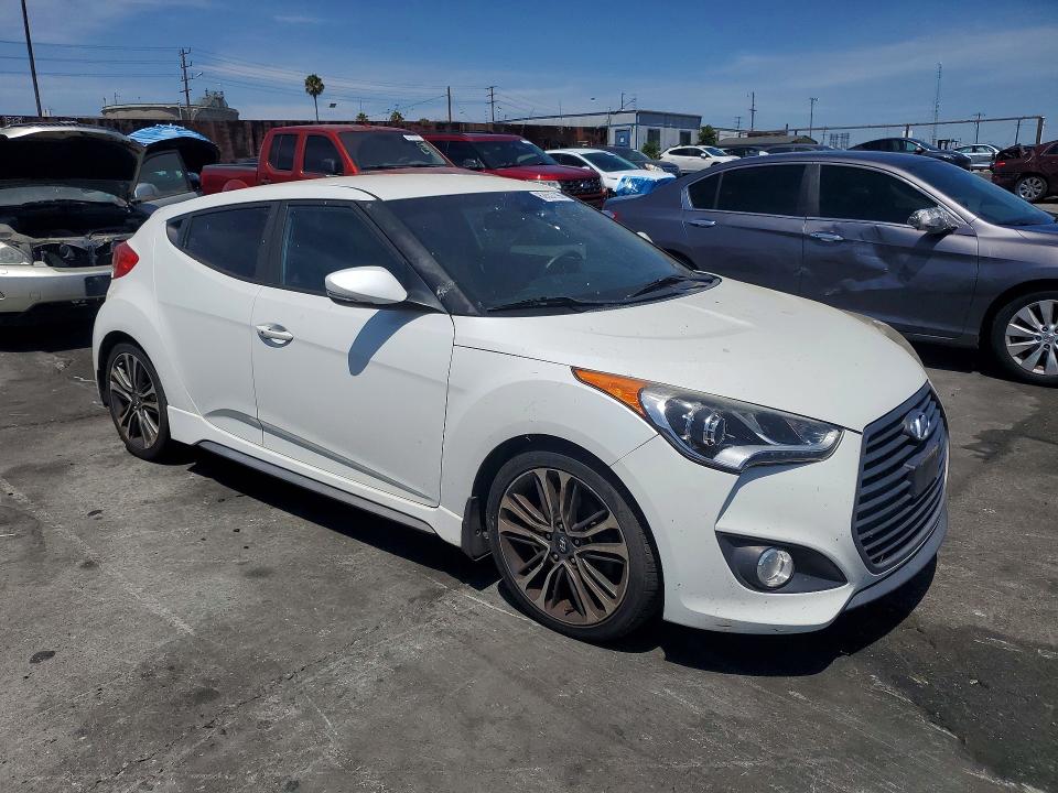 2016 Hyundai Veloster VIN KMHTC6AE8GU302765 COPART salvage auction — NORMAL WEAR, Ca - Dis/Dlr/Exp Only Clean Title, sold $1,250 on 2026-07-31 (photo 4)