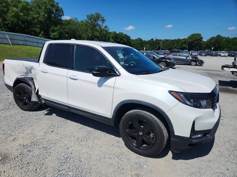 2023 Honda Ridgeline VIN 5FPYK3F86PB006559 COPART salvage auction — SIDE, Nc - Salvage Certificate Of Title, sold $16,600 on 2026-08-19 (photo 4)