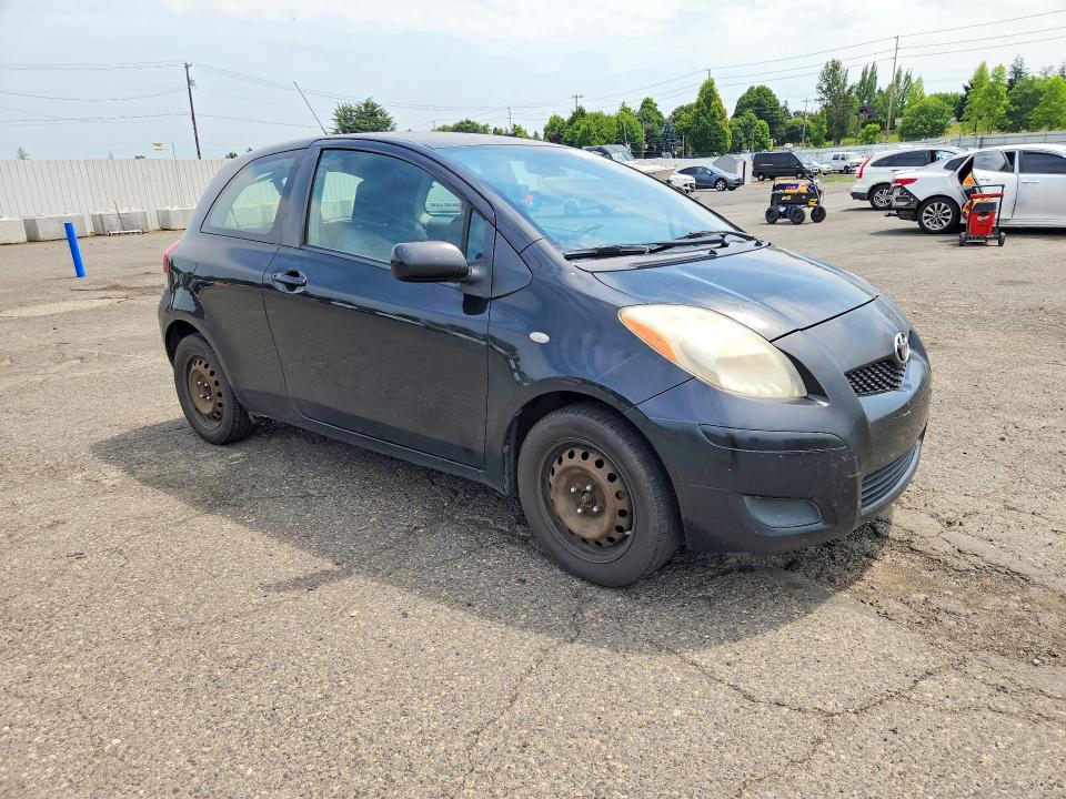 2011 Toyota Yaris VIN JTDJT4K38B5334132 COPART salvage auction — MECHANICAL, OR - NON PUBLIC CLEAN TITLE, sold $150 on 2026-07-22 (photo 4)