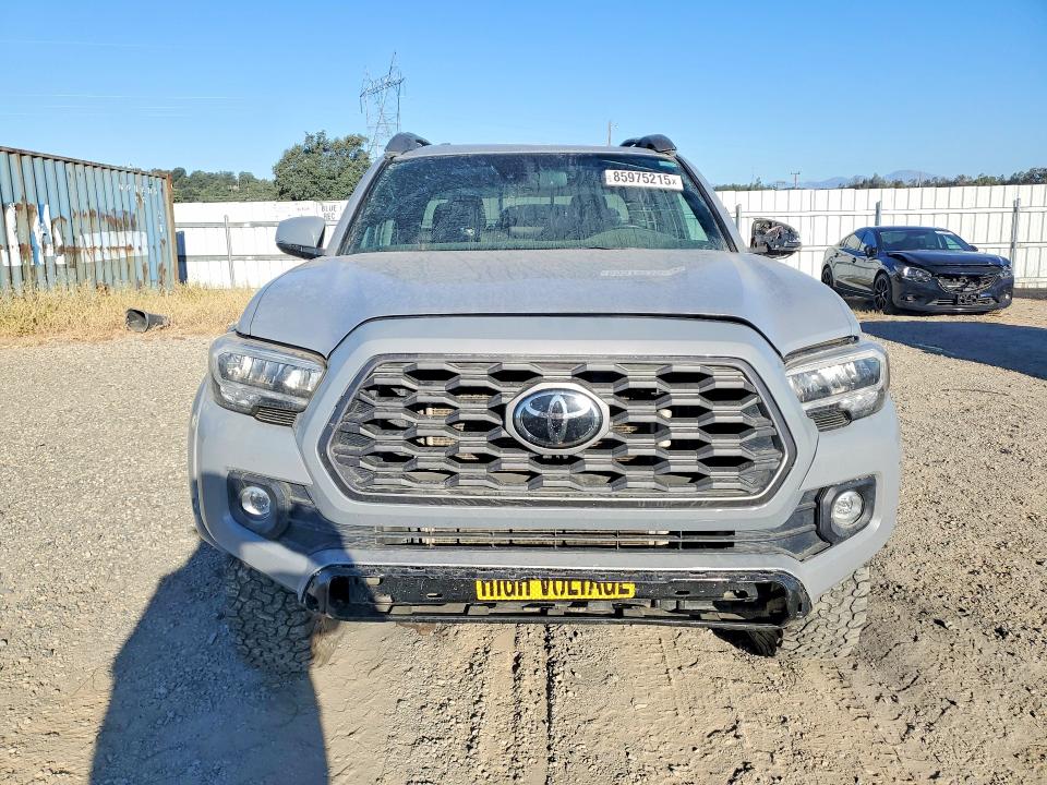 2021 Toyota Tacoma VIN 3TYCZ5AN2MT015925 COPART salvage auction — ROLLOVER, Ca - Salvage Certificate, sold $15,100 on 2026-07-31 (photo 5)