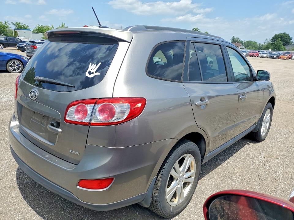 2012 Hyundai Santa fe VIN 5XYZGDAB1CG093748 COPART salvage auction — MINOR DENT/SCRATCHES, On - Permit No Brand - Unfit, sold $250 on 2026-07-21 (photo 3)
