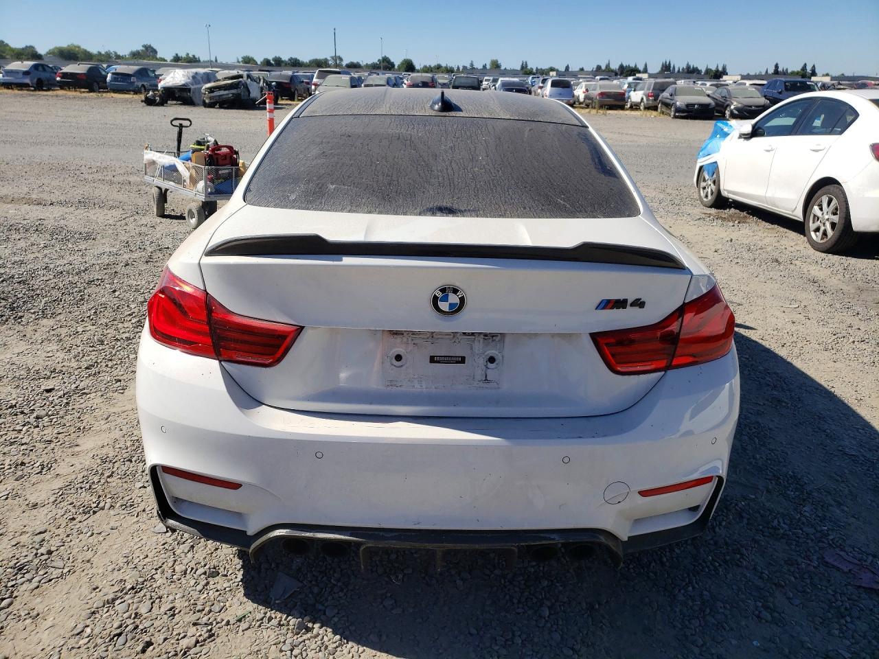 2018 BMW M4 VIN WBS4Y9C5XJAC86890 COPART salvage auction — Side, CA - DIS/DLR/EXP ONLY CLEAN TITLE (P), sold $9,000 on 2026-09-11 (photo 6)