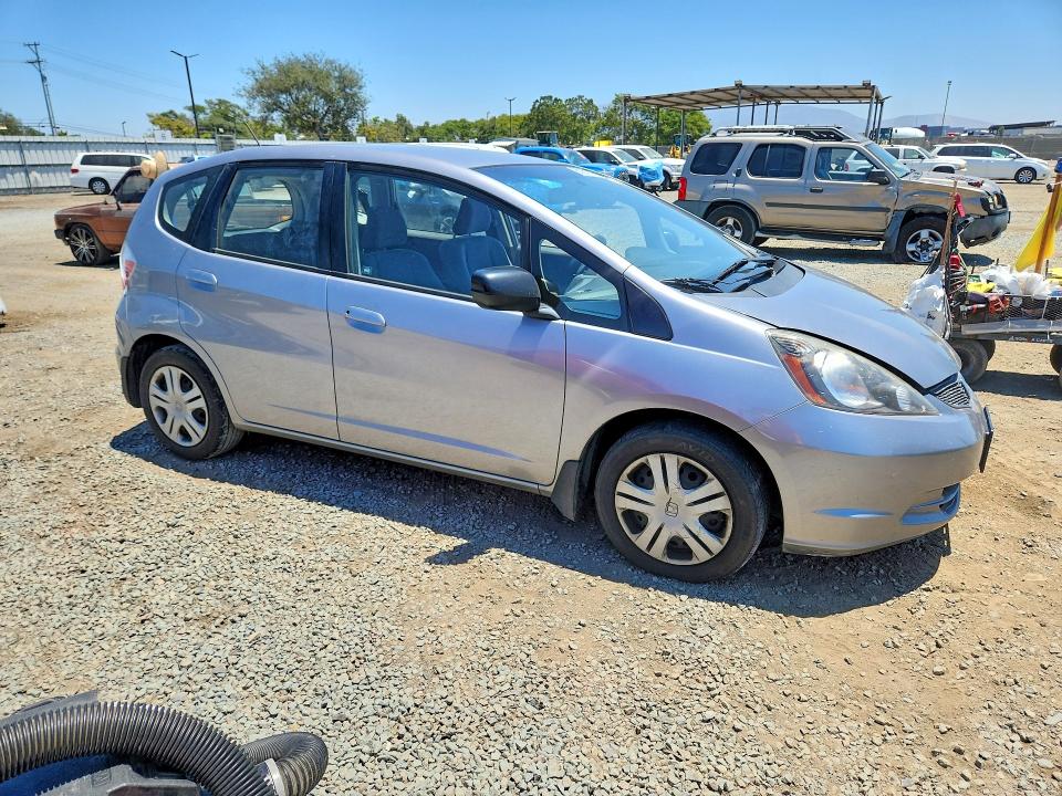 2009 Honda Fit VIN JHMGE88209C002068 COPART salvage auction — FRONT END, CA - DIS/DLR/EXP ONLY CLEAN TITLE, sold $800 on 2026-07-10 (photo 4)