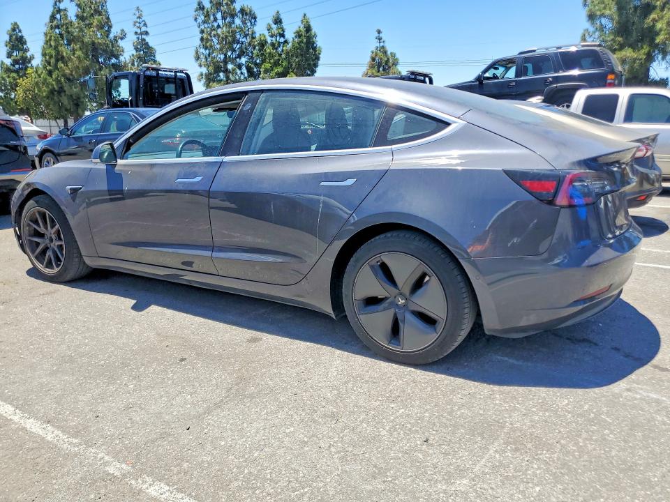 2018 Tesla Model 3 VIN 5YJ3E1EAXJF059176 COPART salvage auction — MINOR DENT/SCRATCHES, Ca - Salvage Certificate, sold $5,800 on 2026-07-16 (photo 2)