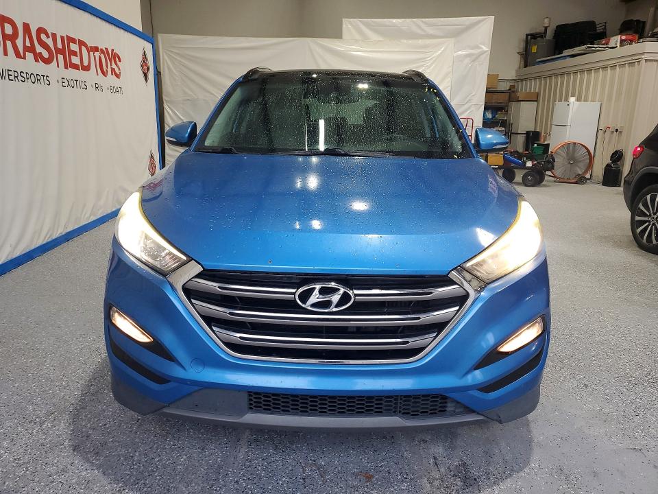 2016 Hyundai Tucson VIN KM8J33A2XGU182429 COPART salvage auction — MINOR DENT/SCRATCHES, Nc - Dealer Only Clean Title, sold $4,350 on 2026-07-30 (photo 5)