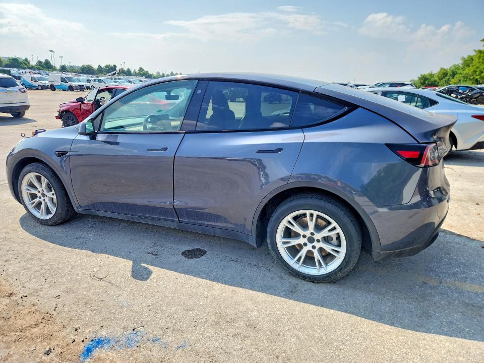 2023 Tesla Model y VIN 7SAYGDEF5PA049323 COPART salvage auction — NORMAL WEAR, MO - CERTIFICATE OF TITLE, sold $9,000 on 2026-07-28 (photo 2)