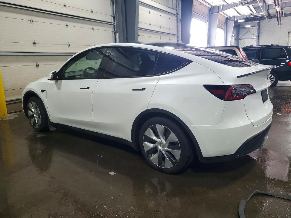 2023 Tesla Model y VIN 7SAYGDEE7PA086381 COPART salvage auction — SIDE, Mn - Cert Of Title-Salvage, sold $3,700 on 2026-08-18 (photo 2)