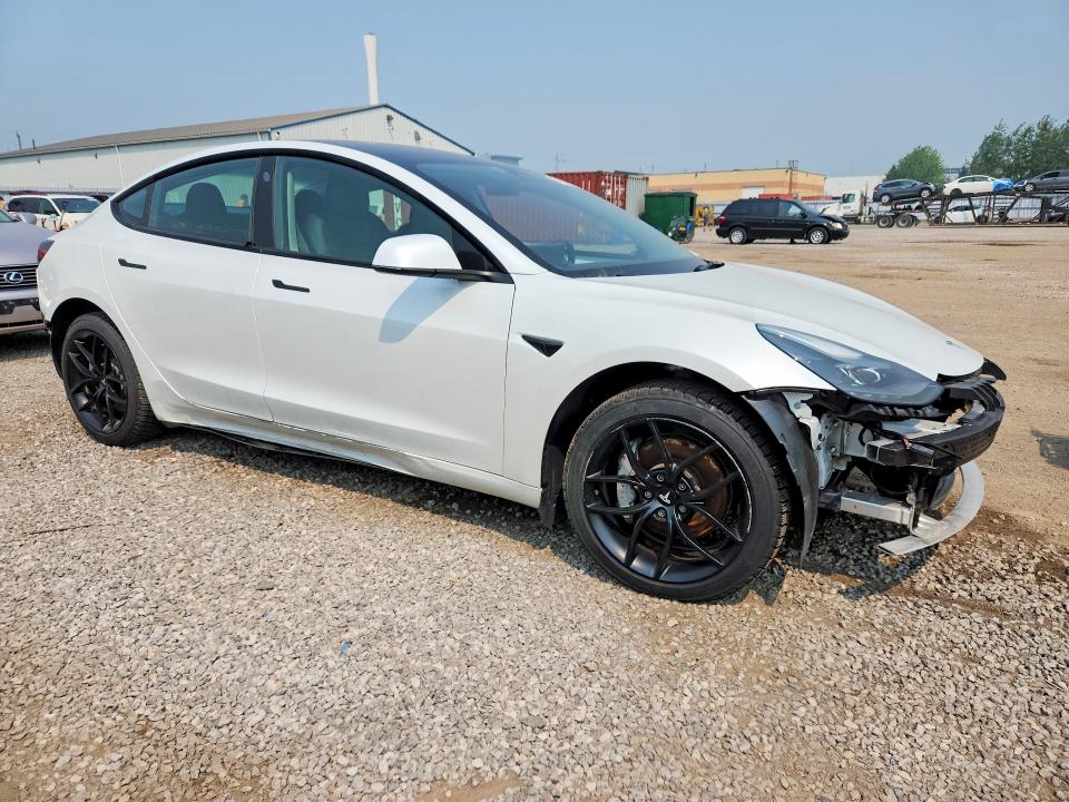 2023 Tesla Model 3 VIN 5YJ3E1EA4PF407014 COPART salvage auction — ALL OVER, ON - PERMIT NO BRAND - UNFIT, sold $3,050 on 2026-07-28 (photo 4)