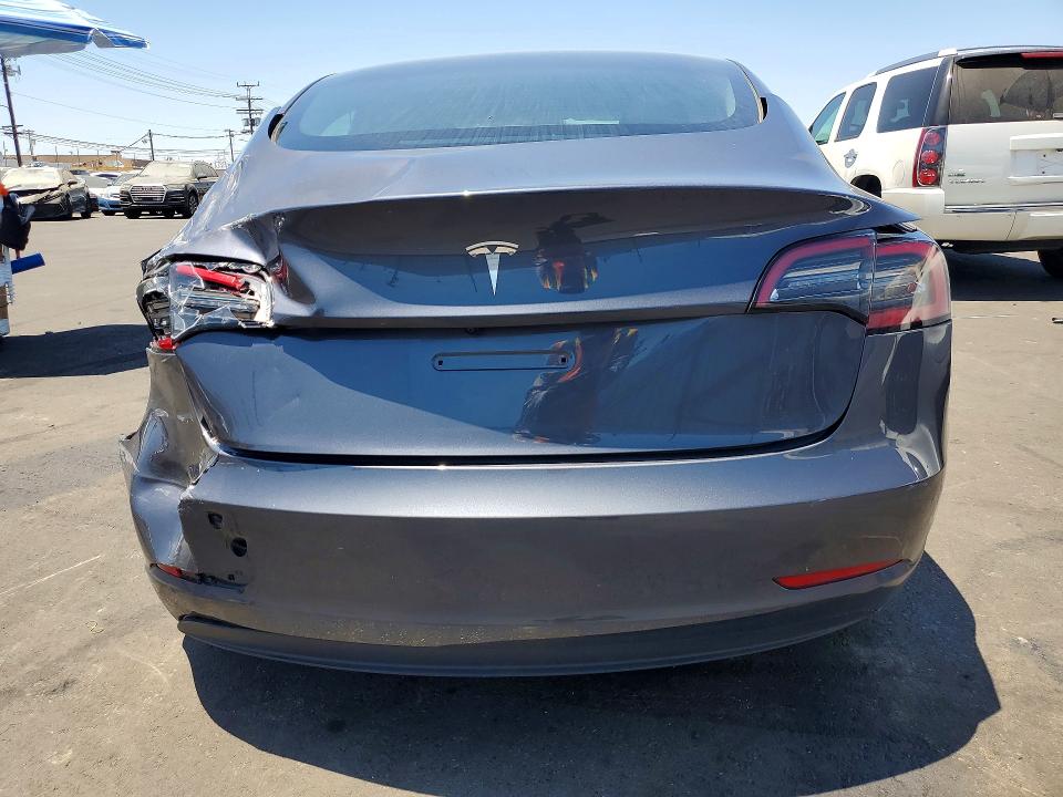 2023 Tesla Model 3 VIN 5YJ3E1EA0PF712946 COPART salvage auction — REAR END, CA - SALVAGE CERTIFICATE, sold $6,400 on 2026-07-29 (photo 6)
