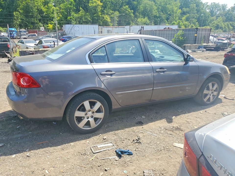 2006 Kia Optima VIN KNAGE124965039832 COPART salvage auction — SIDE, Nc - Salvage Certificate Of Title, sold $125 on 2026-07-30 (photo 3)