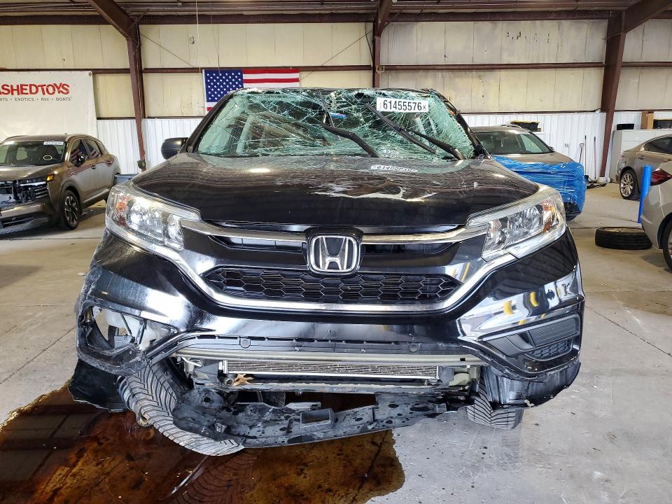 2016 Honda Cr-v VIN 5J6RM4H43GL093898 COPART salvage auction — ROLLOVER, Il - Salvage Certificate, sold $500 on 2026-08-19 (photo 5)