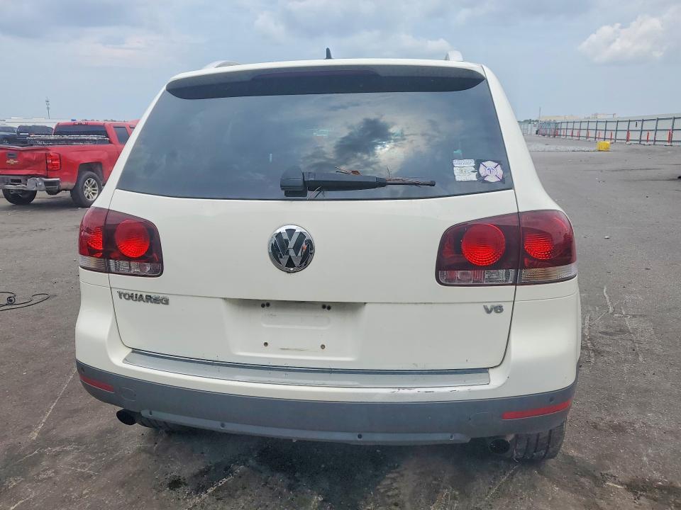 2010 Volkswagen Touareg VIN WVGBF7A95AD004354 COPART salvage auction — NORMAL WEAR, Fl - Certificate Of Title, sold $175 on 2026-08-03 (photo 6)