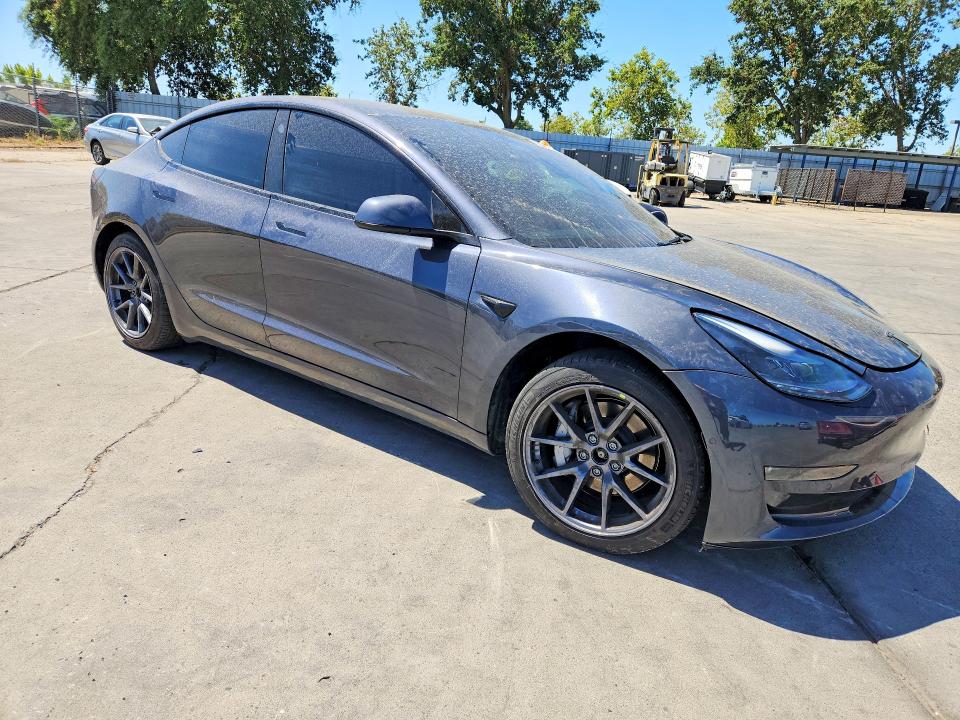 2022 Tesla Model 3 VIN 5YJ3E1EB2NF319634 COPART salvage auction — REAR END, Ca - Salvage Certificate, sold $7,100 on 2026-07-20 (photo 4)