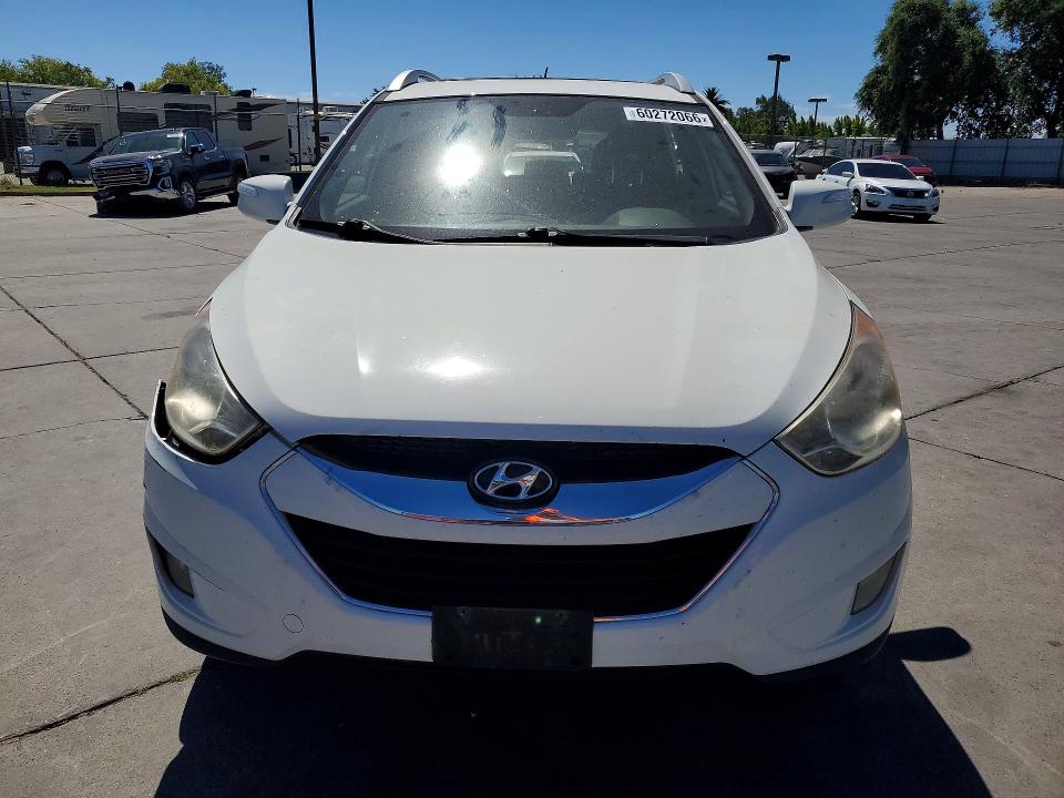 2010 Hyundai Tucson VIN KM8JU3AC5AU085796 COPART salvage auction — REAR END, Ca - Dis/Dlr/Exp Only Clean Title, sold $550 on 2026-07-27 (photo 5)