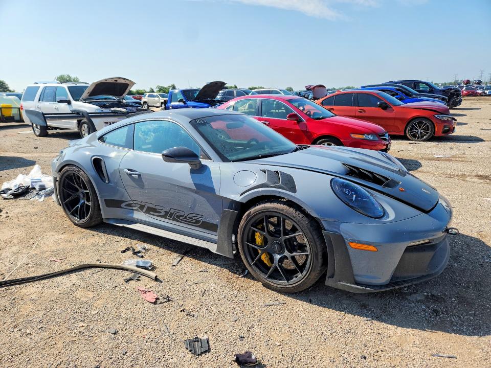2023 Porsche 911 VIN WP0AF2A93PS278045 COPART salvage auction — SIDE, IL - SALVAGE CERTIFICATE, sold $236,000 on 2026-09-01 (photo 4)