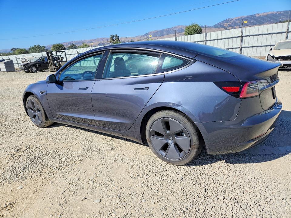 2023 Tesla Model 3 VIN 5YJ3E1EA6PF417513 COPART salvage auction — SIDE, Ca - Salvage Certificate, sold $6,900 on 2026-07-14 (photo 2)
