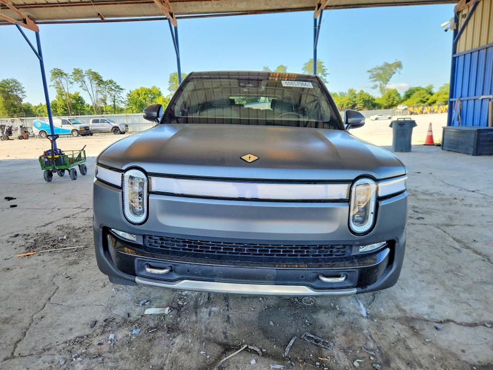 2023 Rivian R1s VIN 7PDSGABA2PN016190 COPART salvage auction — ROLLOVER, GA - CERT OF TITLE-SALVAGE, sold $19,300 on 2026-10-08 (photo 5)