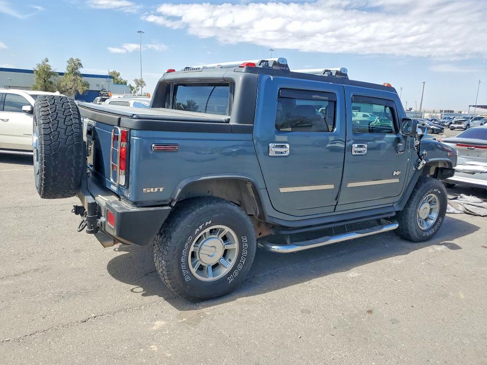 2005 Hummer H2 VIN 5GRGN22U95H115294 COPART salvage auction — MINOR DENT/SCRATCHES, Tx - Cert Of Title-Rebuilt Salvage (P), sold $9,700 on 2026-07-28 (photo 3)