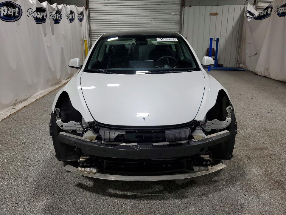 2022 Tesla Model 3 VIN 5YJ3E1EA5NF285535 COPART salvage auction — FRONT END, Fl - Certificate Of Title, sold $8,900 on 2026-07-27 (photo 5)