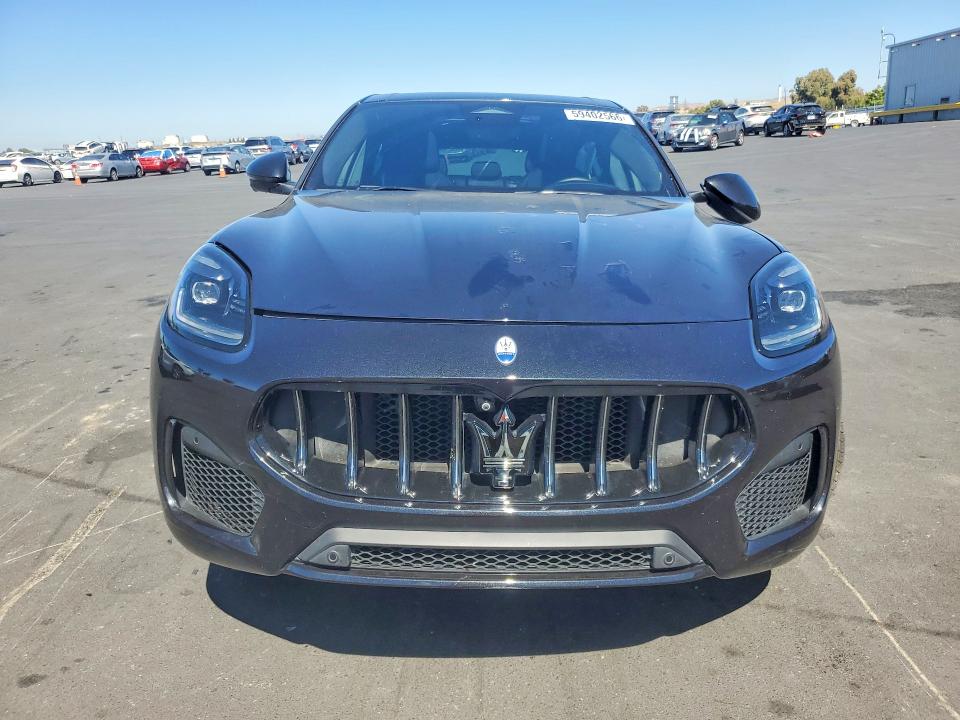2024 Maserati Grecale VIN ZN6PMDAA7R7458686 COPART salvage auction — SIDE, Id - Salvage Certificate Of Title, sold $15,400 on 2026-10-12 (photo 5)