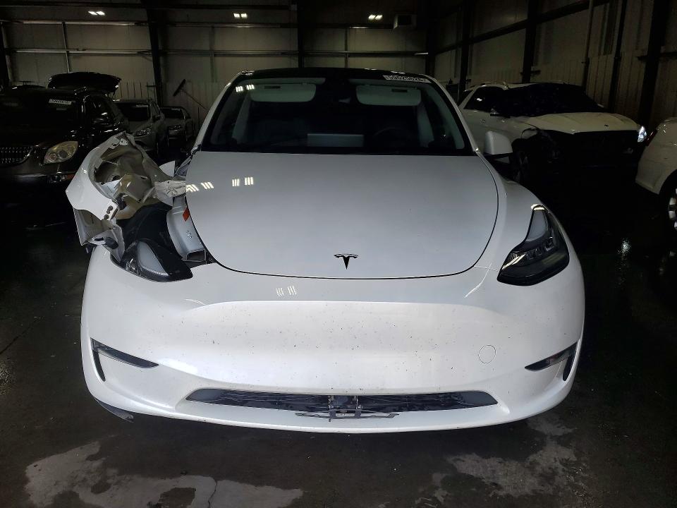 2023 Tesla Model y VIN 7SAYGDEE7PA086381 COPART salvage auction — SIDE, Mn - Cert Of Title-Salvage, sold $3,700 on 2026-08-18 (photo 5)