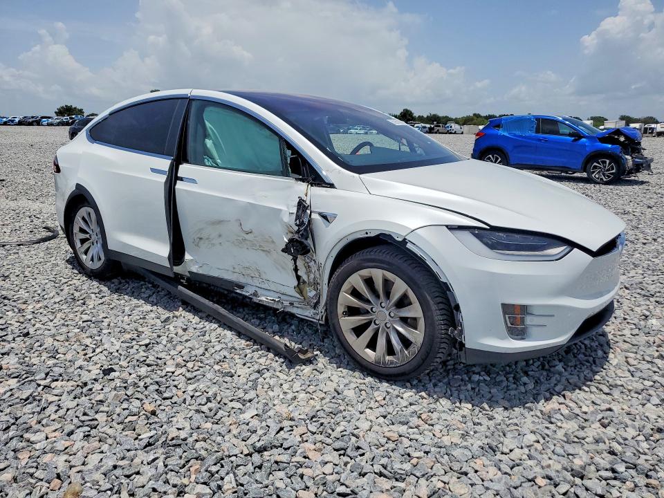 2018 Tesla Model x VIN 5YJXCBE27JF118237 COPART salvage auction — SIDE, Fl - Cert Of Title Slvg Rebuildable, sold $5,500 on 2026-07-24 (photo 4)
