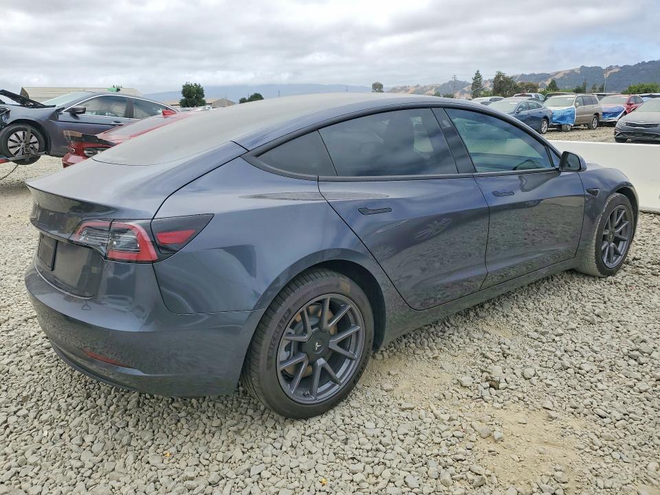 2021 Tesla Model 3 VIN 5YJ3E1EAXMF998770 COPART salvage auction — REAR END, Ca - Salvage Certificate, sold $7,200 on 2026-07-14 (photo 3)
