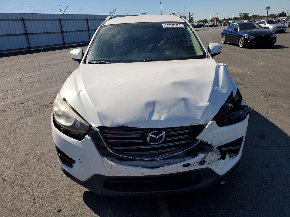 2016 Mazda VIN JM3KE2BY8G0900221 COPART salvage auction — FRONT END, Ca - Salvage Certificate, sold $1,650 on 2026-07-30 (photo 5)